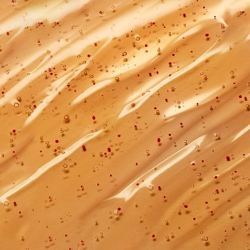 Golden gel texture with jojoba oil beads